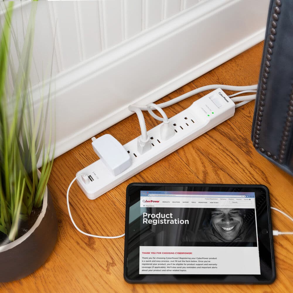 CyberPower P704URC1 white surge protector with 7 outlets and 4 ft cord